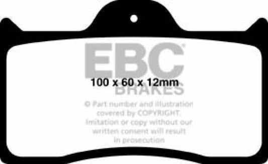 EBC Redstuff Ceramic Brake Pads for performance braking, shown in a close-up image with red friction material and metal backing plates.