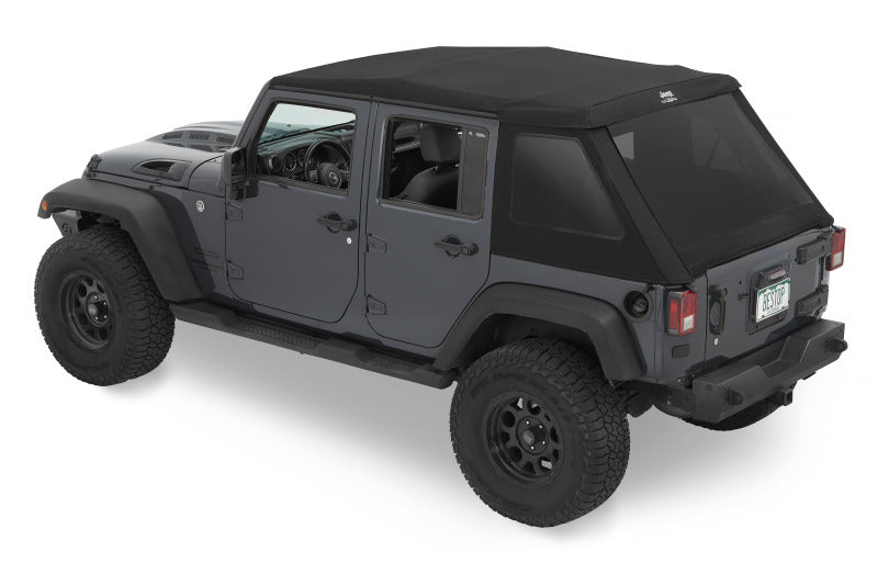 Bestop Trektop Glide soft top for 2007-2018 Jeep Wrangler JK 4-door in premium black twill fabric, shown installed on Jeep.