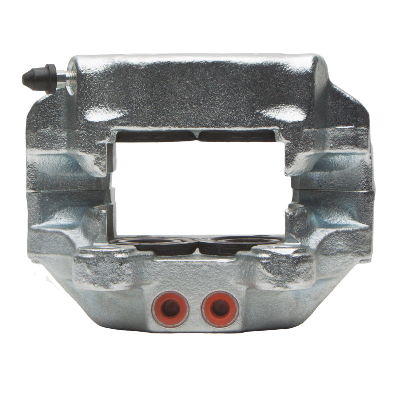 Silver zinc coated DFC 69-76 BMW 1600 front-l premium OE brake caliper on vehicle brake system.