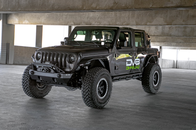 Steel DV8 Offroad FS-25 Stubby front bumper with plated bull bar on Jeep Wrangler and Gladiator JT/JK/JL, rugged offroad look.