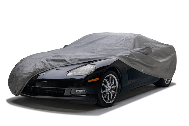 Gray Covercraft 25-26 Land Rover Defender custom 5-layer indoor car cover draped over vehicle for protection.
