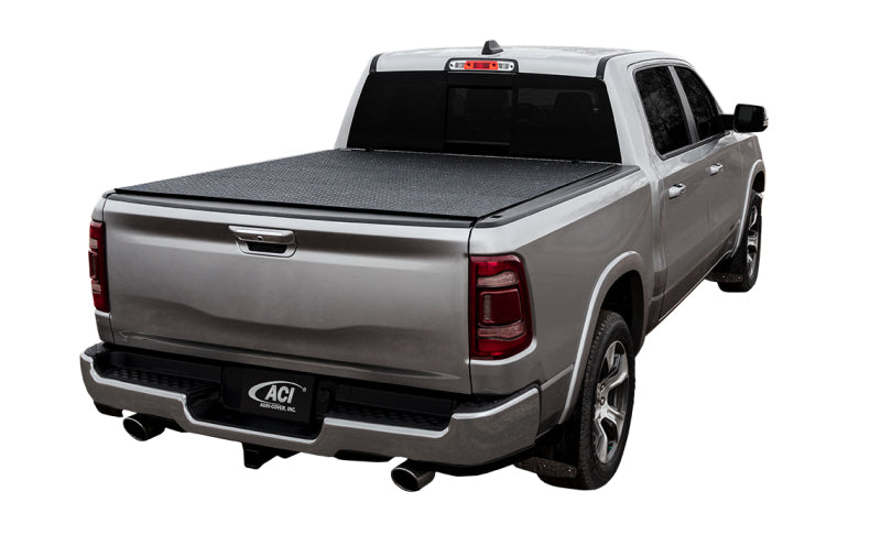 Access LOMAX tri-fold truck bed cover in black diamond mist for 2019 Dodge Ram 1500 with 5ft 7in box, exterior truck bed accessory.