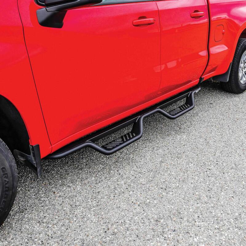 Westin Outlaw Drop Nerf Bars in Tex Black on a Chevy Silverado/GMC Sierra 1500-3500 double cab pickup truck.