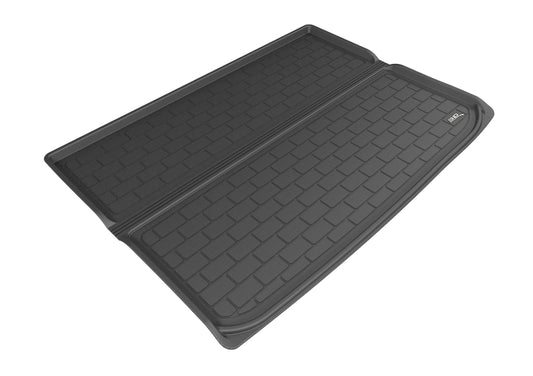Black 3D MAXpider rubber cargo liner for 2015-2020 Chevrolet Suburban, designed to protect the vehicle's cargo area floor.