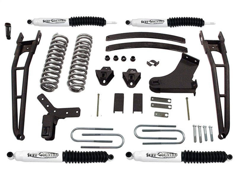 Tuff Country 4-inch lift kit for 1983-1997 Ford Ranger 4x4 off-road vehicle, showing parts of the suspension lift components.