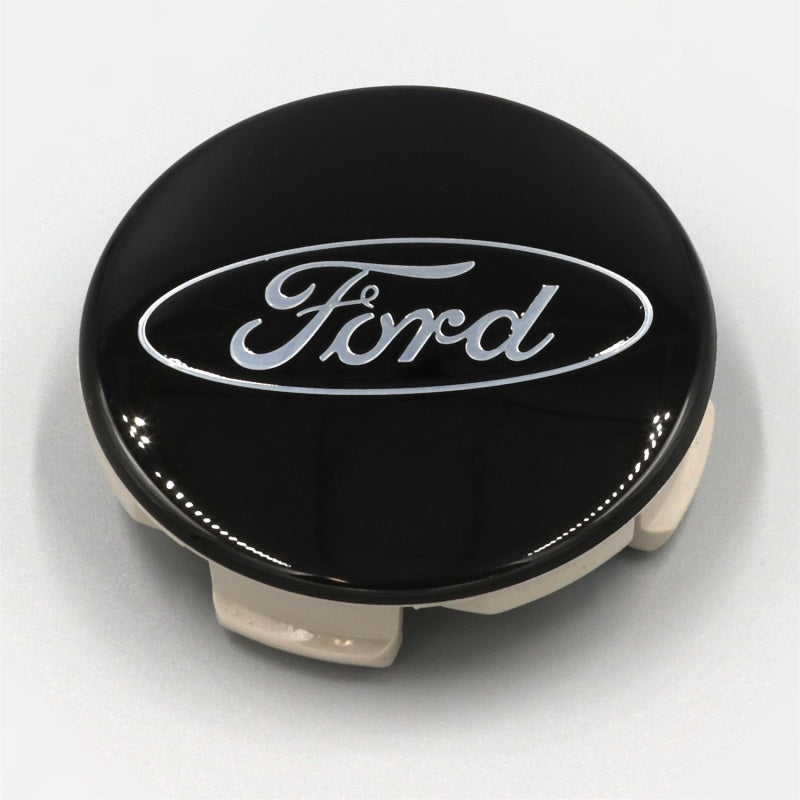 Ford Racing black and chrome wheel center cap kit for trucks and SUVs showing close-up of caps with Ford Racing logo.