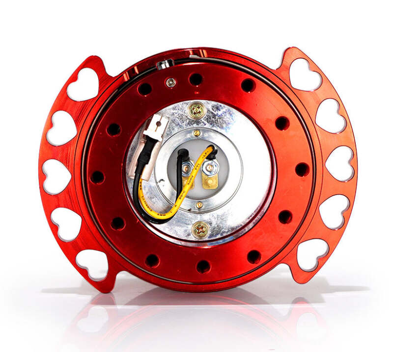 NRG Quick Release Kit with red body and heart cutout ring, designed for easy attachment and removal of steering wheels.