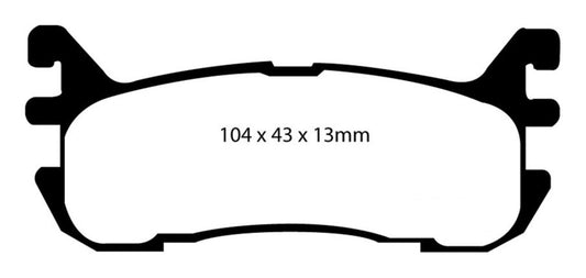 EBC Redstuff rear brake pads for Ford Escort 2.0, performance brake pads with red friction material, shown installed on vehicle.