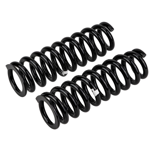 Front coilover spring for Toyota Prado to 2003 by Old Man Emu, showing a close-up of the coil spring installed on a vehicle suspension system.