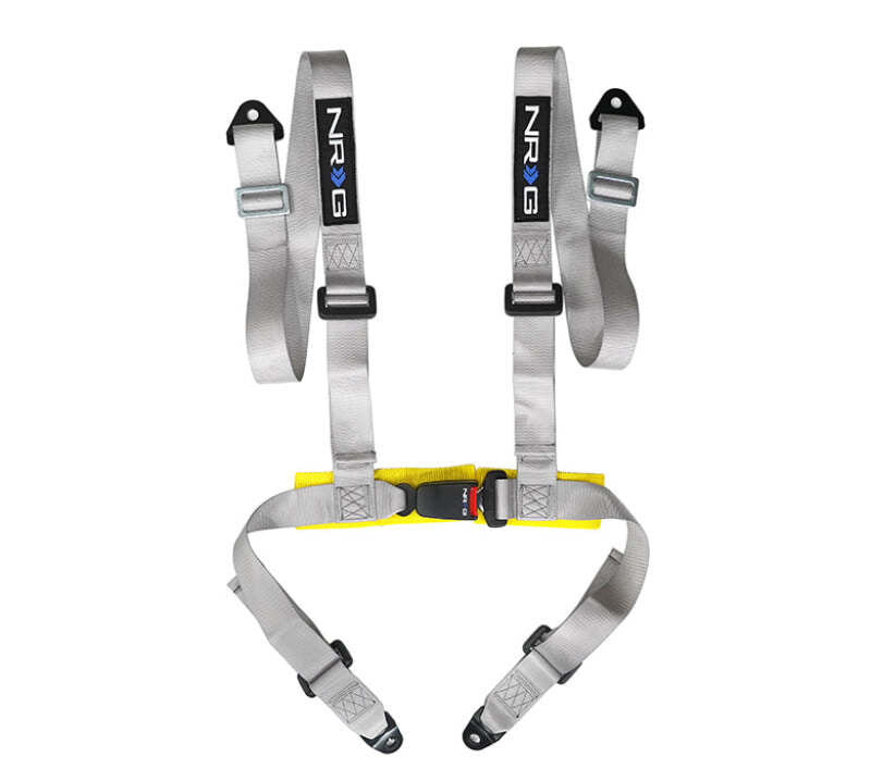 NRG silver 4-point seat belt harness and buckle lock, racing-style safety harness for cars, with metal buckles and straps.