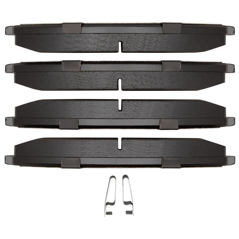 Front R1 Optimum OE brake pads for Mazda MPV 1992-2006 by R1 Concepts, showing the black brake pad with metal backing plate.