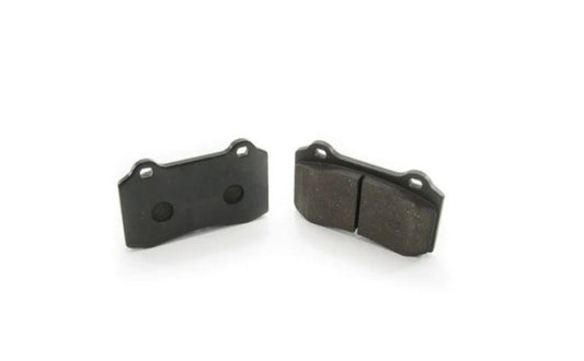Alcon 2007+ Jeep JK front performance brake pad set with metallic friction material, designed for optimal braking performance.