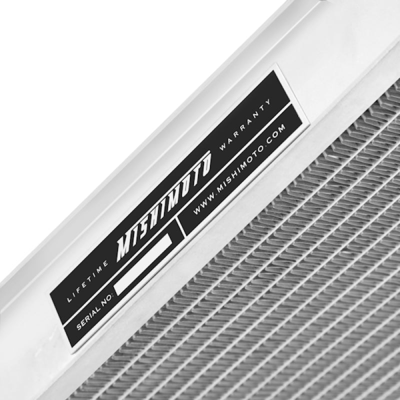 Mishimoto 07-09 Nissan 350Z manual aluminum radiator showing core fins and side tanks for efficient cooling.