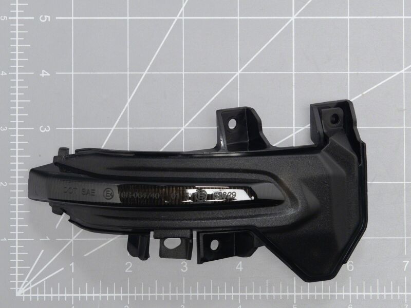 Raxiom smoked LED mirror lights installed on Toyota Tundra side mirrors, featuring sequential LED turn signals.