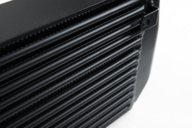 Black CSF intercooler for Hyundai Veloster N and i30 N, stepped core design, high-performance automotive cooling component