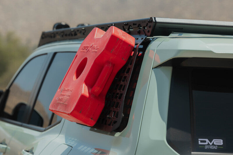 DV8 Offroad Toyota 4Runner exterior window Molle panel for DV8 roof rack, mounted on driver side.