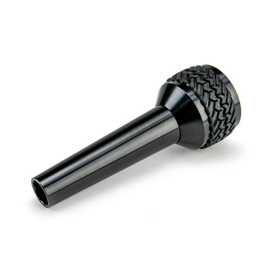 Black DV8 Offroad 6-speed shift knob for 2005-2010 Jeep TJ and JK, featuring a sleek, durable finish and ergonomic design.