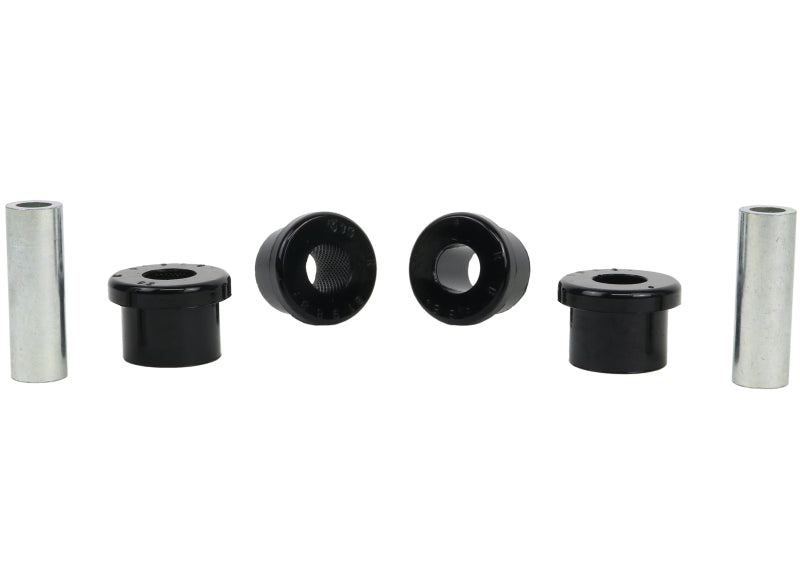 Whiteline Plus front control arm lower inner bushing kit for Mitsubishi Evo III to VI, showing bushings installed on control arm.
