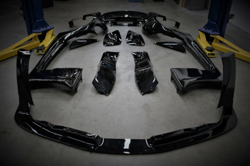 HKS premium body kit for 2020 Toyota Supra A90, showcasing the front and side exterior design without a wing.