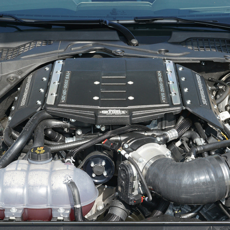 Edelbrock Stage 1 Supercharger kit for 2018 Ford Mustang GT 5.0L, showing the supercharger unit and related components.