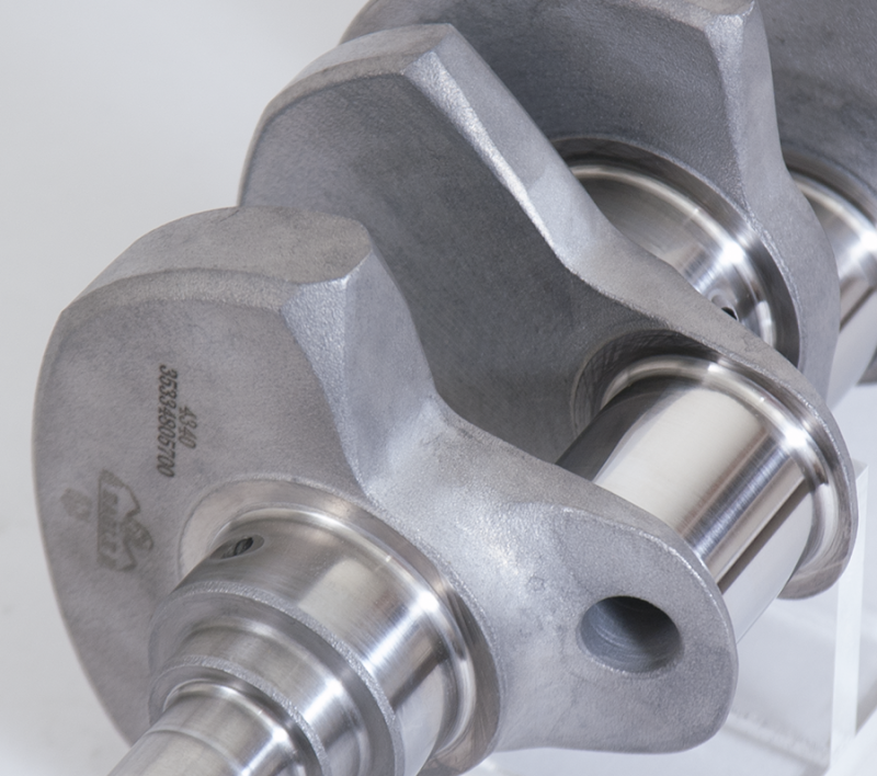 Eagle Chevrolet 305/350 rear seal crankshaft with forged 4340 steel, 3.480-inch stroke, visible in engine component image
