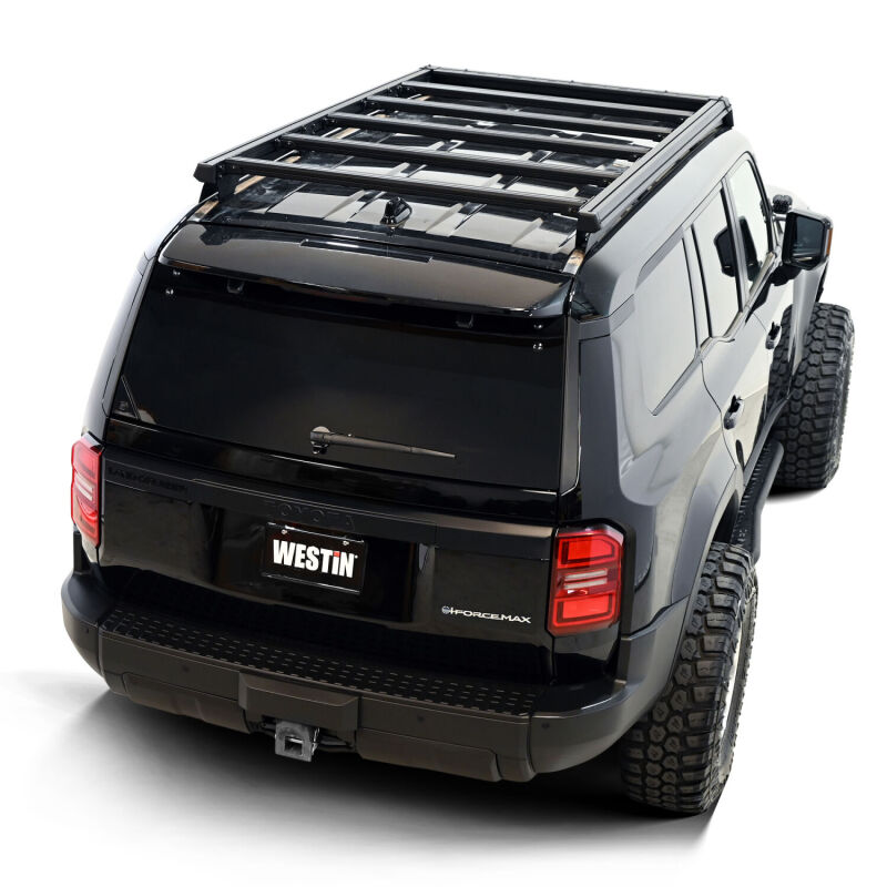 Westin 2026 Toyota Land Cruiser Mesa roof rack shown installed on vehicle, durable metal construction with secure mounting points.