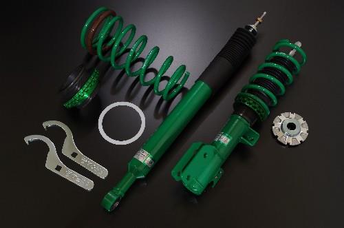 Tein Street Basis Z coilovers installed on a 1996-2000 Honda Civic EM/EJ model, showing the adjustable suspension components.
