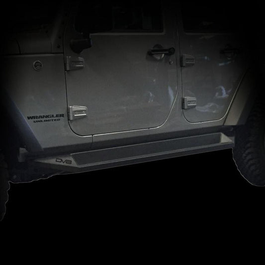 DV8 Offroad matte black steel rock slider side steps for 2007-2018 Jeep Wrangler JK 4-door, mounted along vehicle sides.