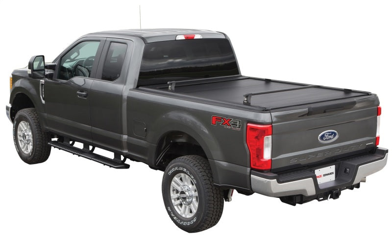 Pace Edwards UltraGroove retractable bed cover on a 2017 Ford F-Series Super Duty 6ft 9in bed, metal construction, closed position.