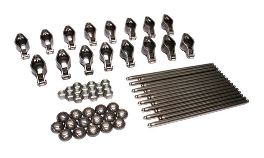 COMP Cams Magnum rocker arm and pushrod kit showing metallic rocker arms and pushrods for high-performance engine.