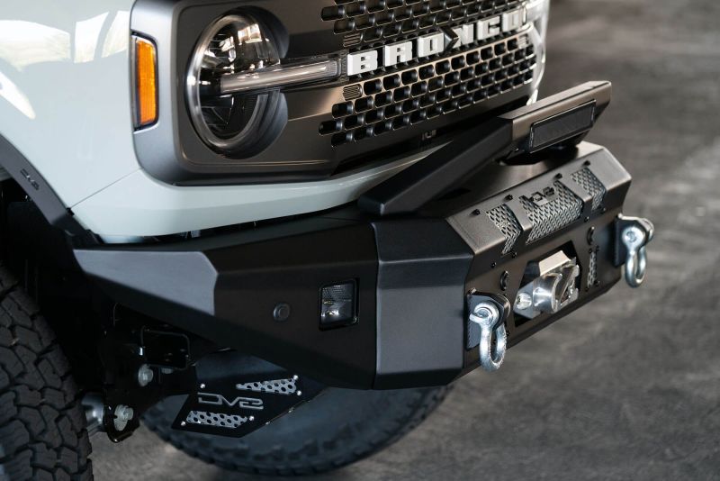 Steel DV8 Offroad bull bar add-on for Ford Bronco bumpers with 13-inch Elite Series light bar mount.