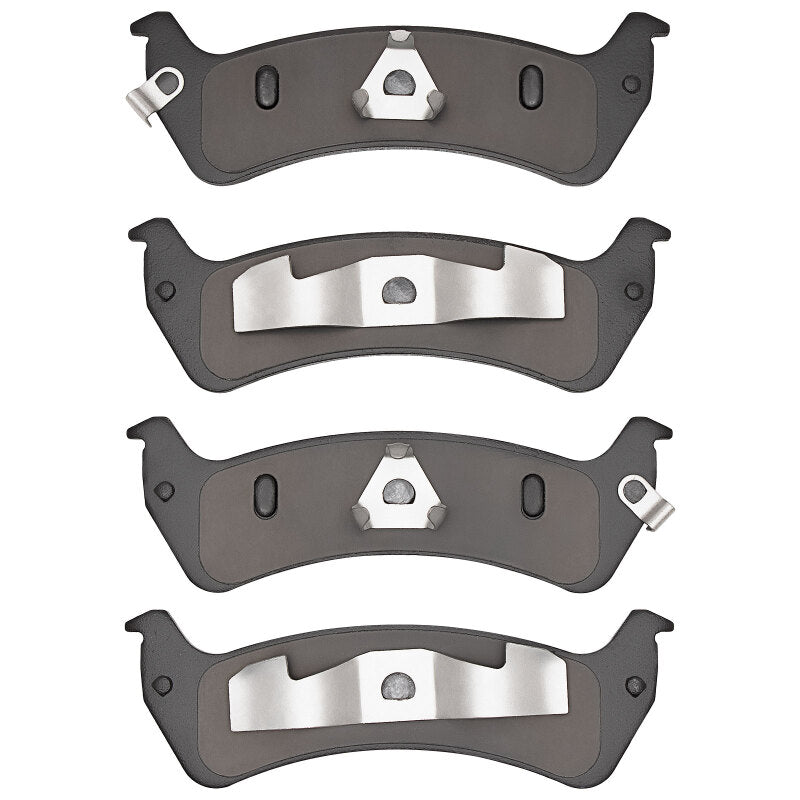 R1 Concepts OE brake pads for Jeep Grand Wagoneer 1993-2005, rear view showing friction surfaces and mounting hardware