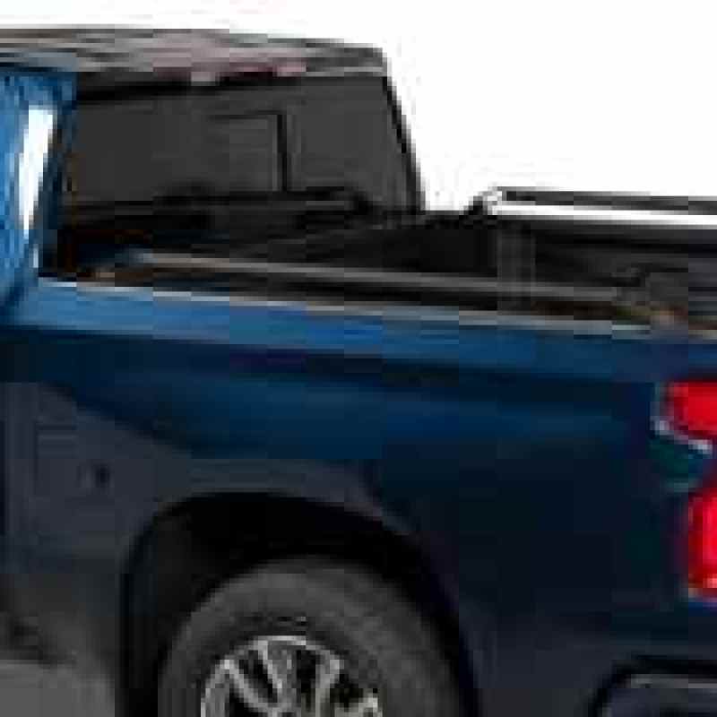 Putco black powder-coated 6.5ft bed locker side rails on Toyota Tundra, exterior body armor and rock rails for truck bed protection.