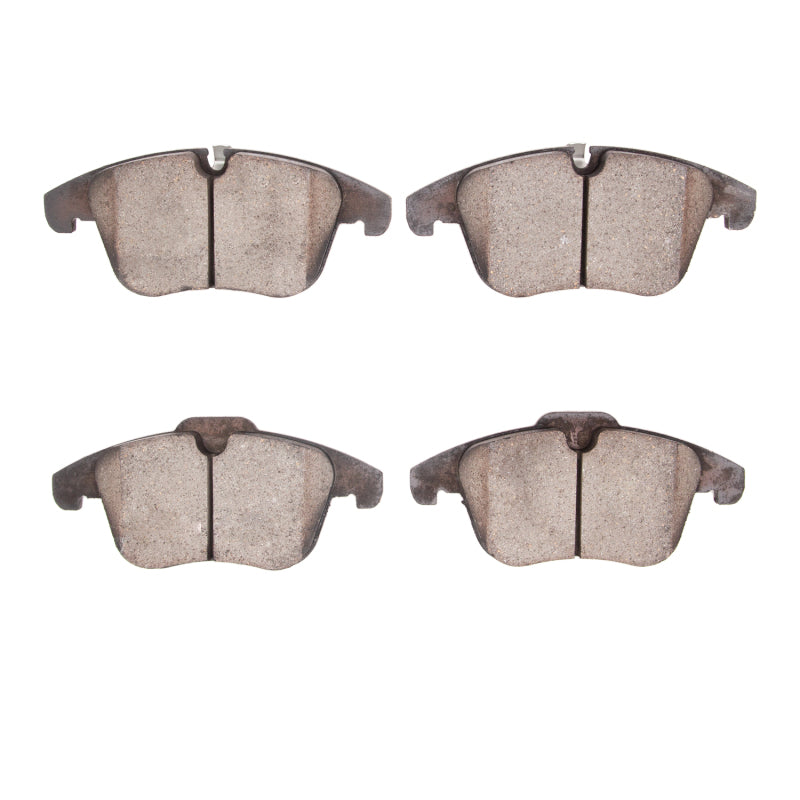 R1 Concepts OE front ceramic brake pads for Jaguar XE 2017-2019, showing the new brake pad set with metal backing plates.