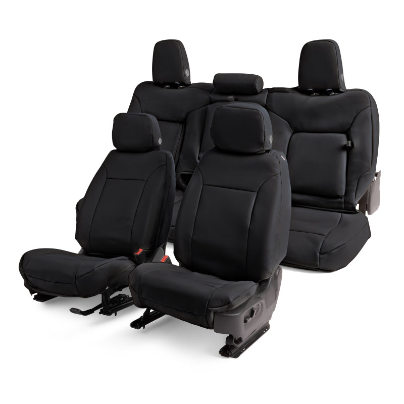 Covercraft black Leatherette PrecisionFit front seat covers installed in a 2021-2024 Ford F150 pickup truck.