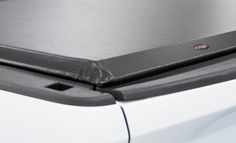 Access Limited 97-03 Ford F-150 8ft bed with Heritage Roll-Up Truck Bed Cover, showing the exterior view of the black soft cover.