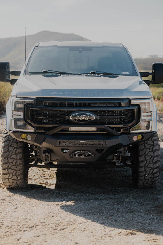 Steel front bumper for Ford Super Duty F-250/F-350 from DV8 Offroad's Spec Series, designed for durability and off-road protection.