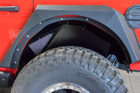 Black DV8 Offroad rear inner fenders for Jeep Wrangler JL 2018+ wheel well liners, showcasing the rugged design and fitment.