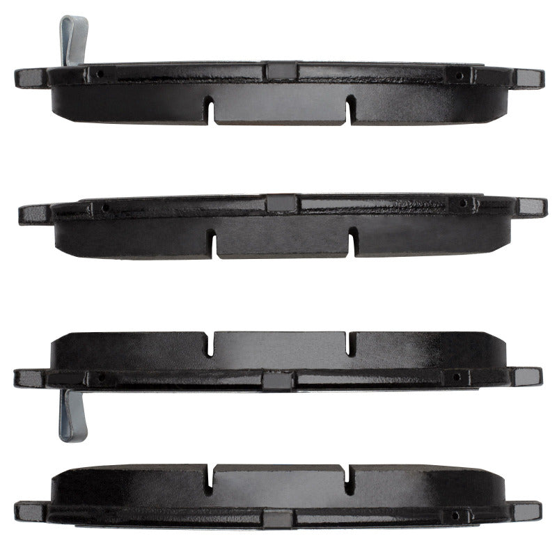 R1 Concepts R1 09-15 Toyota Venza front semi-metallic OE brake pads with metal backing plates and brake surface.