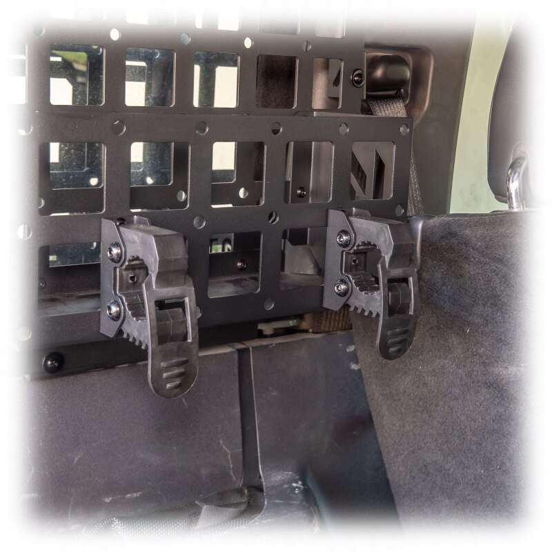 TURN Offroad Molle rubber clamp mount for off-road gear, featuring secure hook and handle design for versatile utility use.