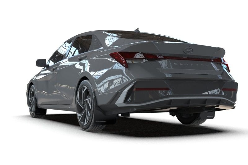 Rally Armor black mud flaps with grey logo installed on a Hyundai Elantra N/N Line, protecting wheel arches.
