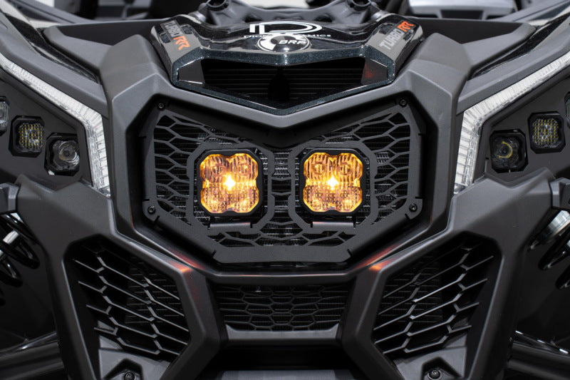 Diode Dynamics 17-24 Can-Am Maverick X3 Stage Series LED grille kit with Pro White fog lights installed on vehicle front.