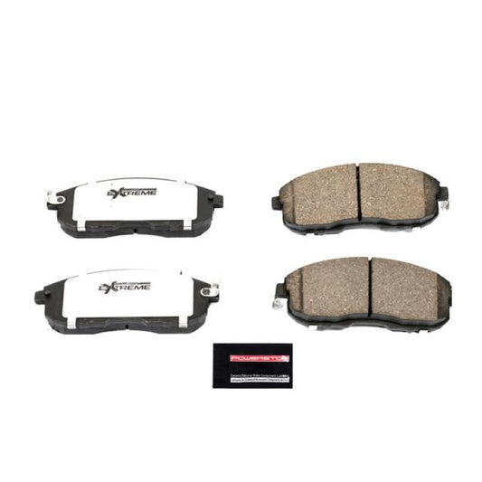 PowerStop Z26 Extreme Street brake pads for Infiniti G35 front, with hardware, high-performance brake replacement.