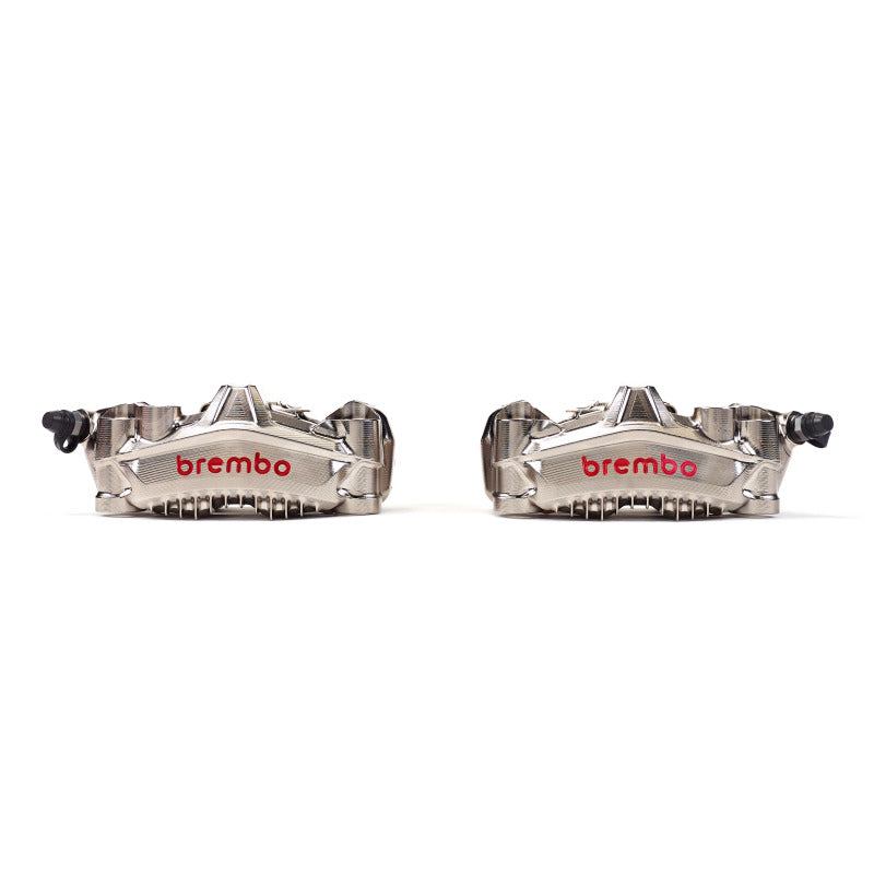 Brembo GP4 Moto GP brake caliper in black with silver accents, showcasing its high-performance OE motorcycle brake caliper design.