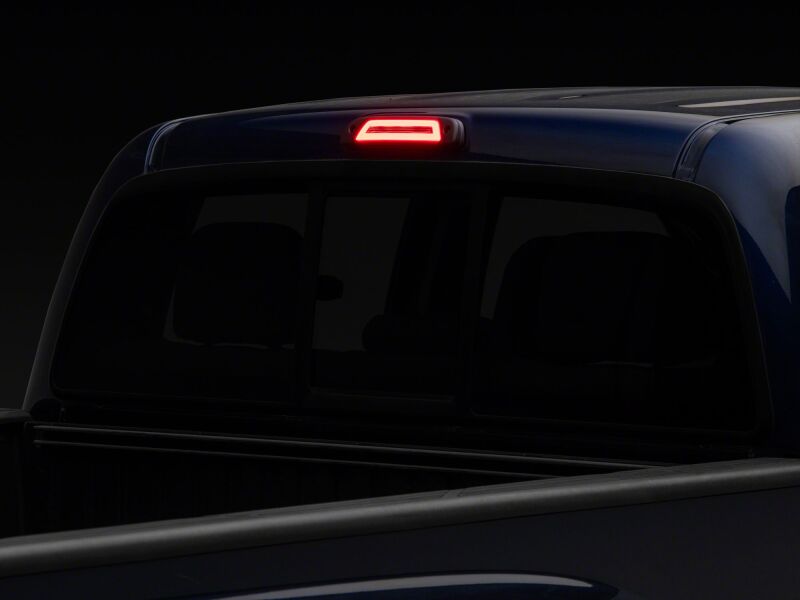 Raxiom smoked LED third brake light for 2005-2015 Toyota Tacoma Axial Series, showcasing the smoked lens design.