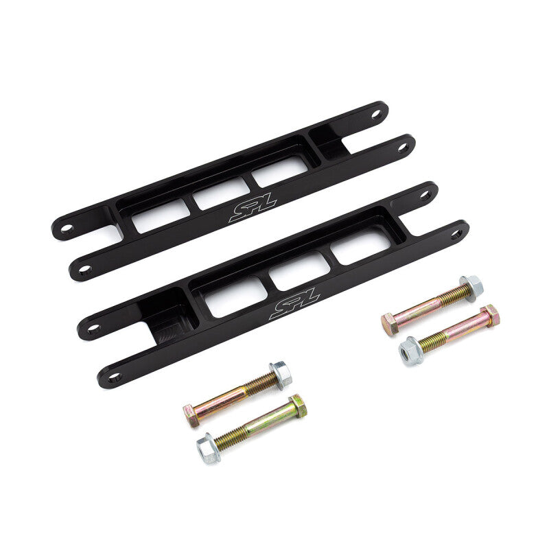 SPL Parts black anodized BMW E8X/E9X rear lower trailing control arms showing detailed metal finish and mounting points.