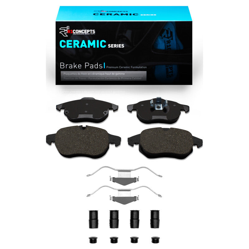 R1 Concepts OE front ceramic brake pads and hardware kit for Saab 9-3 2003-2005, showing brake pad set with hardware components.