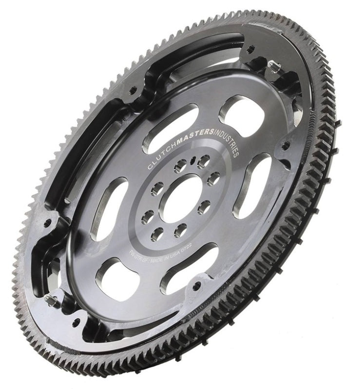 Clutch Masters steel flywheel for Nissan GT-R R35 DCT, showing the textured metal surface and bolt holes for installation.