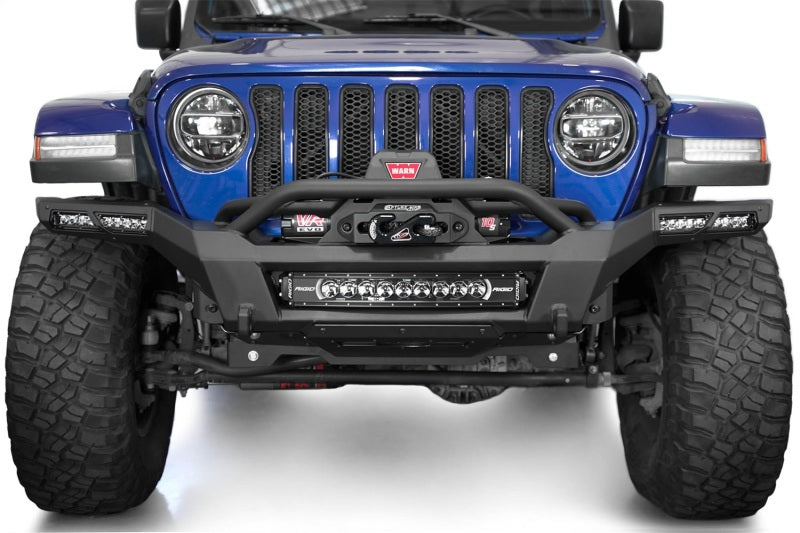 Addictive Desert Designs steel rear bumper for Jeep Wrangler JL and Gladiator JT with built-in winch mount and rugged design.