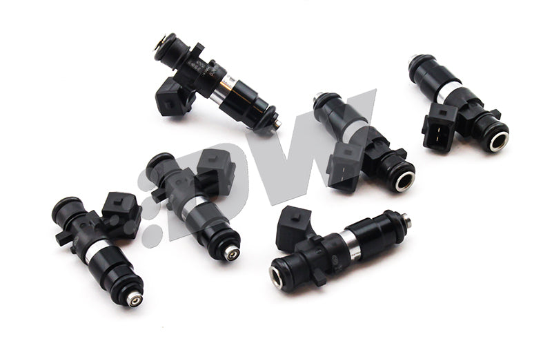 DeatschWerks Bosch EV14 1200cc fuel injector set for Nissan GTR VR38DETT engine, showing six high-performance injectors.